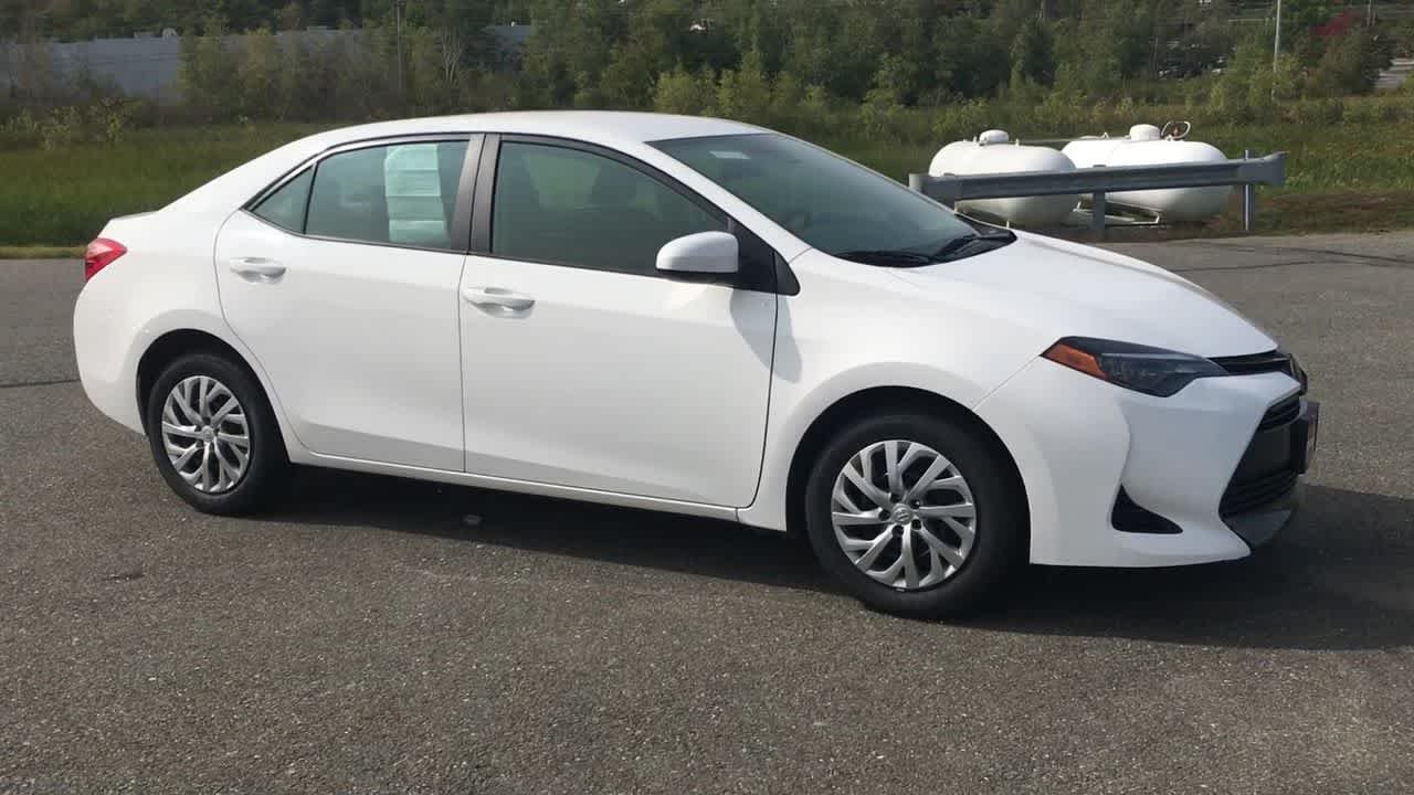 Used 2018 Super White Toyota LE image 2