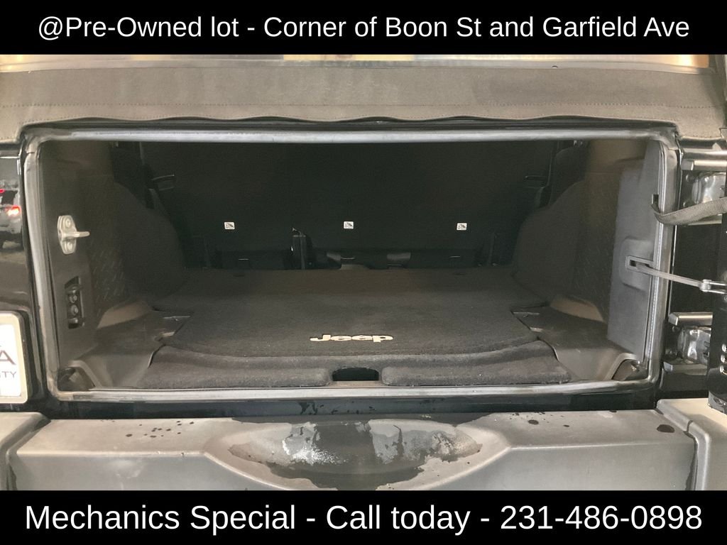 Used 2015 Black Jeep Unlimited Sport image 25