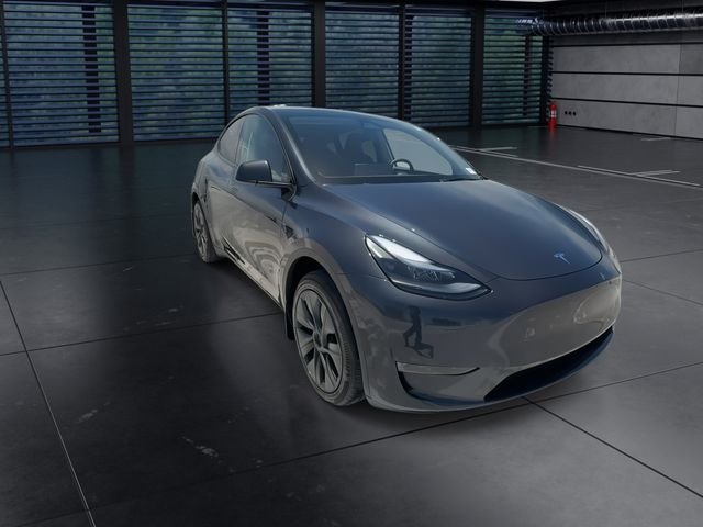 Used 2025 Tesla Model Y Long Range with VIN 7SAYGDED7SF229171 for sale in North Miami, FL