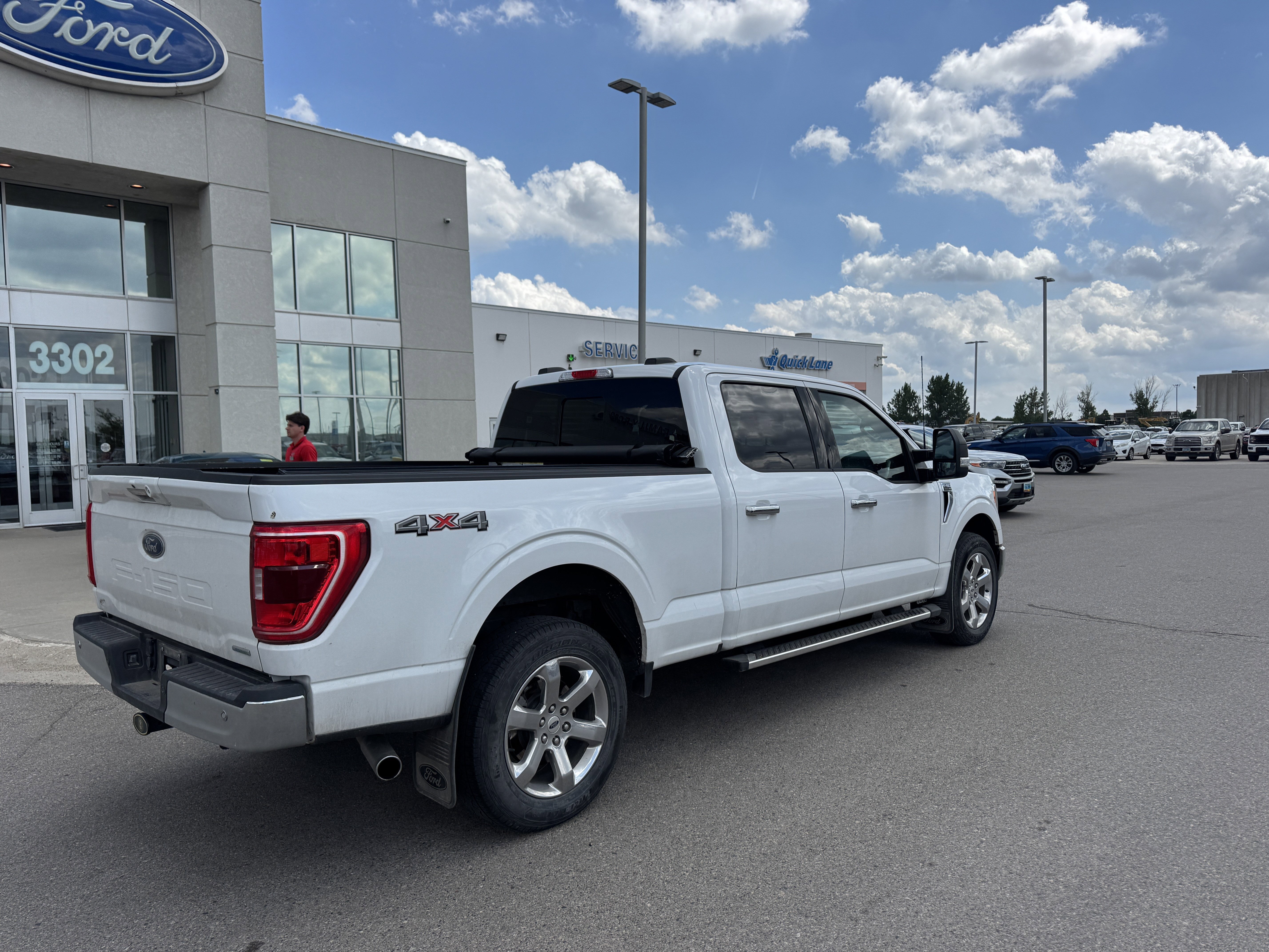Used 2024 Rapid Red Metallic Tinted Clearcoat Ford XLT image 4