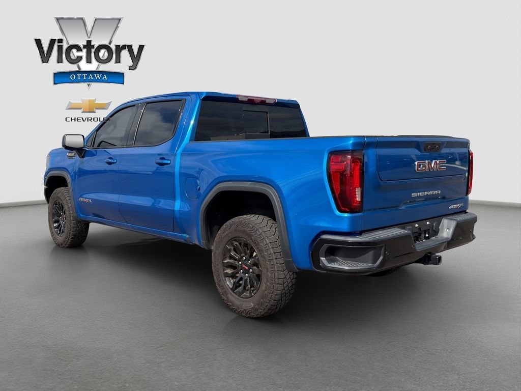 Used 2023 Dynamic Blue Metallic GMC AT4X image 4
