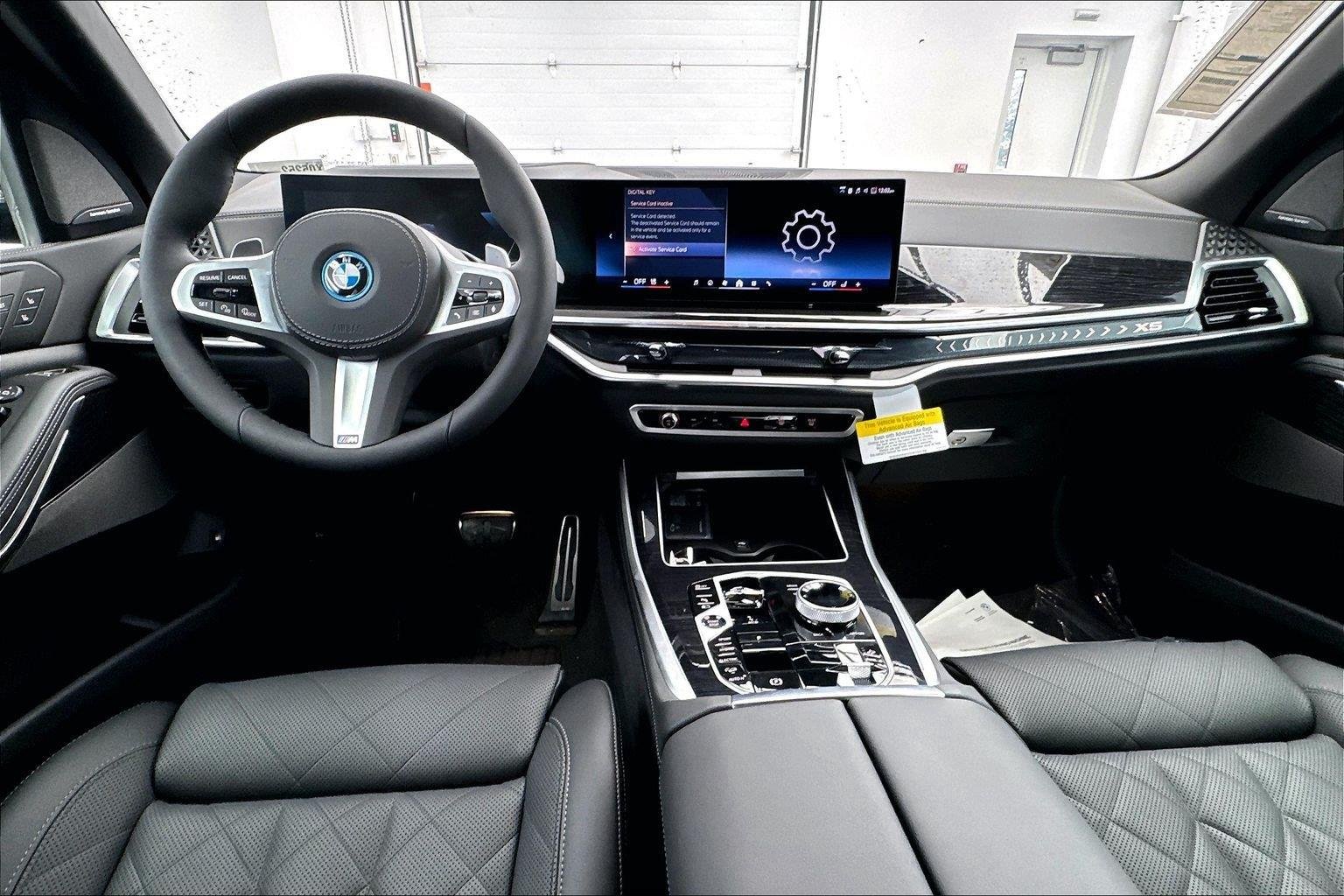 New 2026 Black Sapphire Metallic BMW xDrive50e image 10