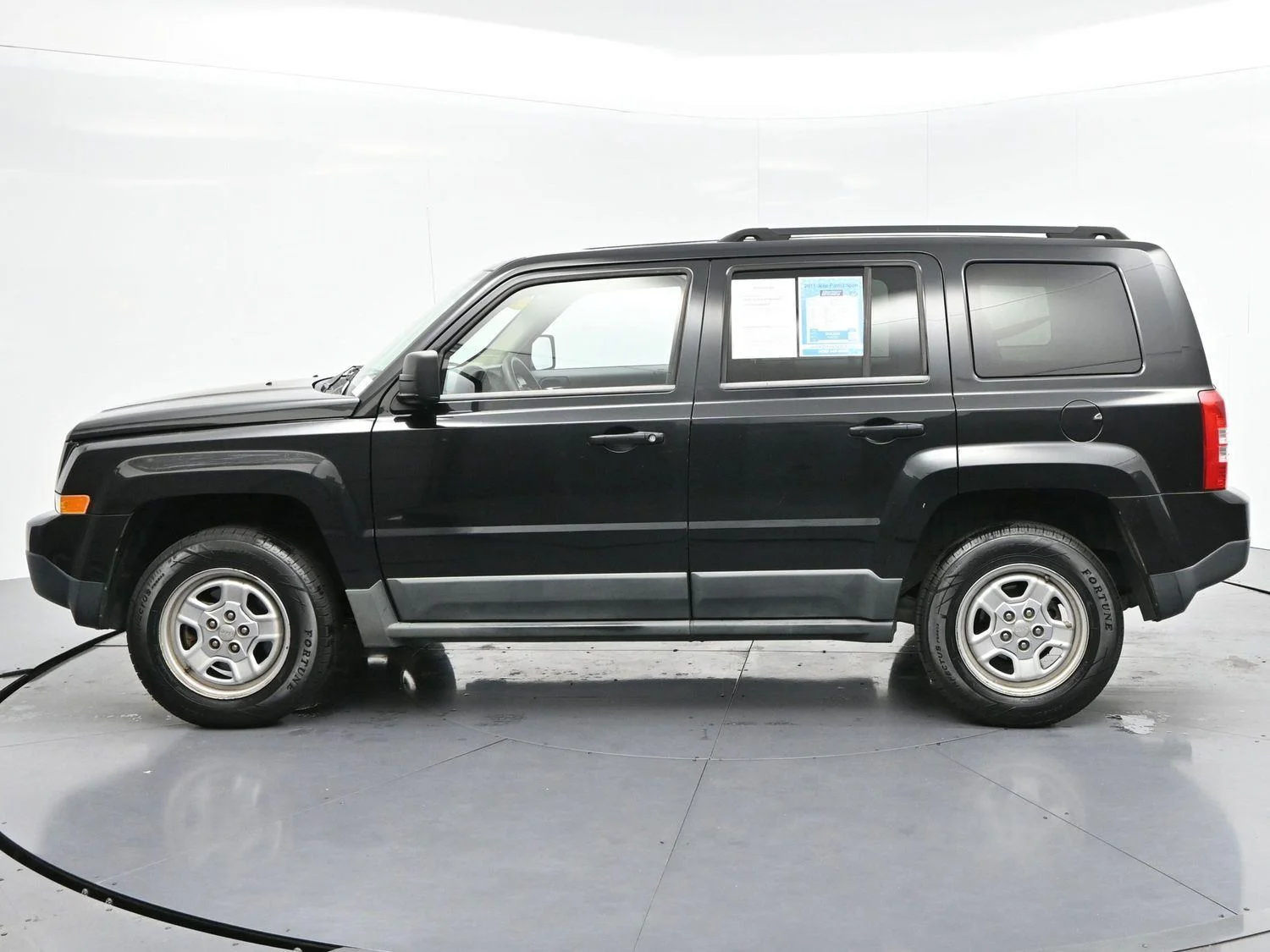 Used 2011 Brilliant Black Crystal Pearl Jeep Sport image 4