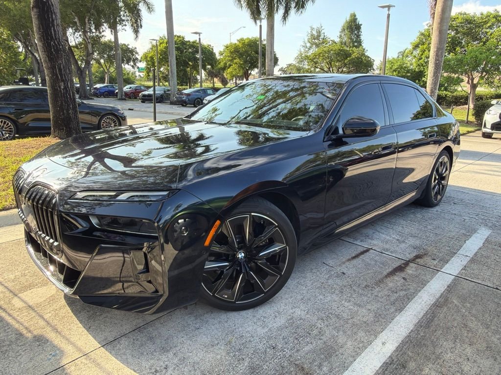 Certified Used 2023 Carbon Black Metallic BMW xDrive60 image 1
