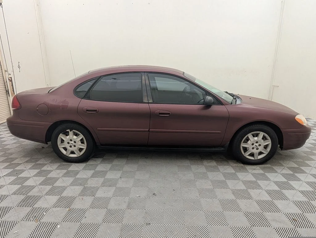 Used 2005 Ford Taurus SE with VIN 1FAFP53U05A309668 for sale in Kissimmee, FL