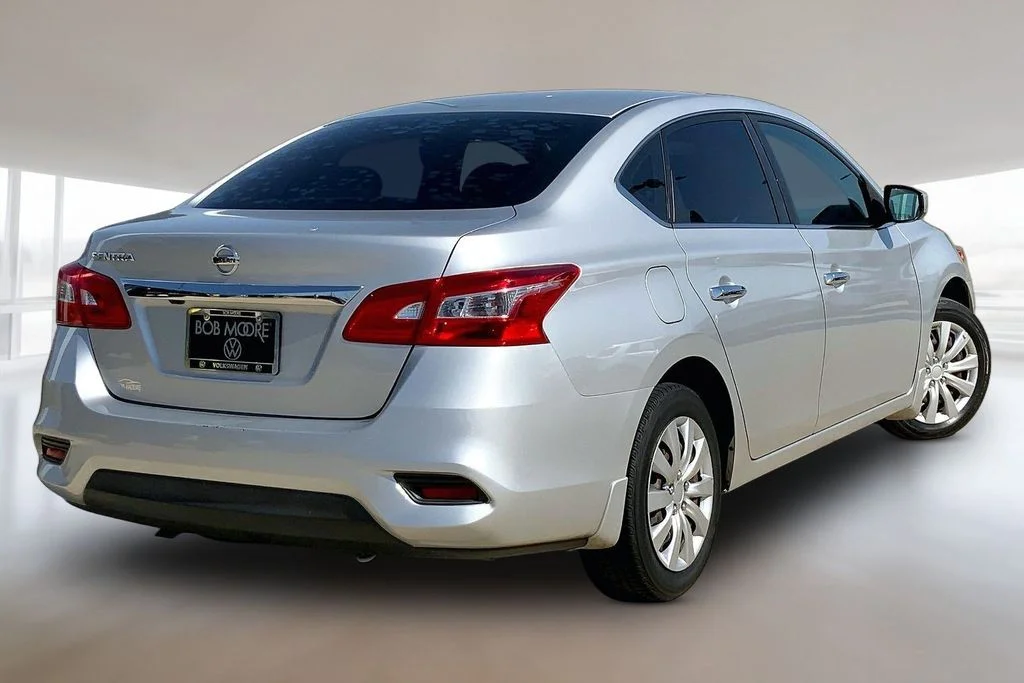 Used 2018 Brilliant Silver Metallic Nissan S image 2