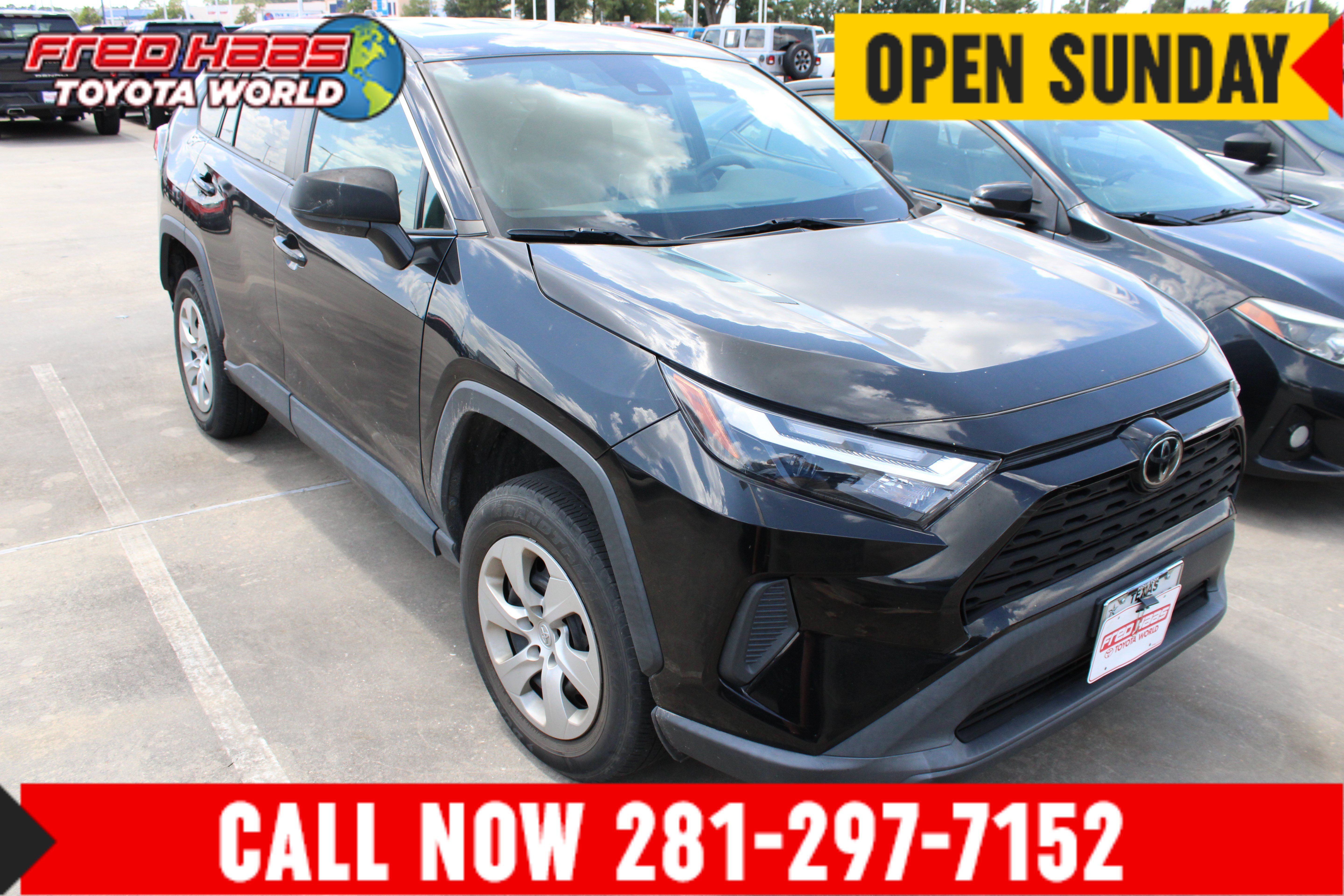 Used 2023 Midnight Black Metallic Toyota LE image 1