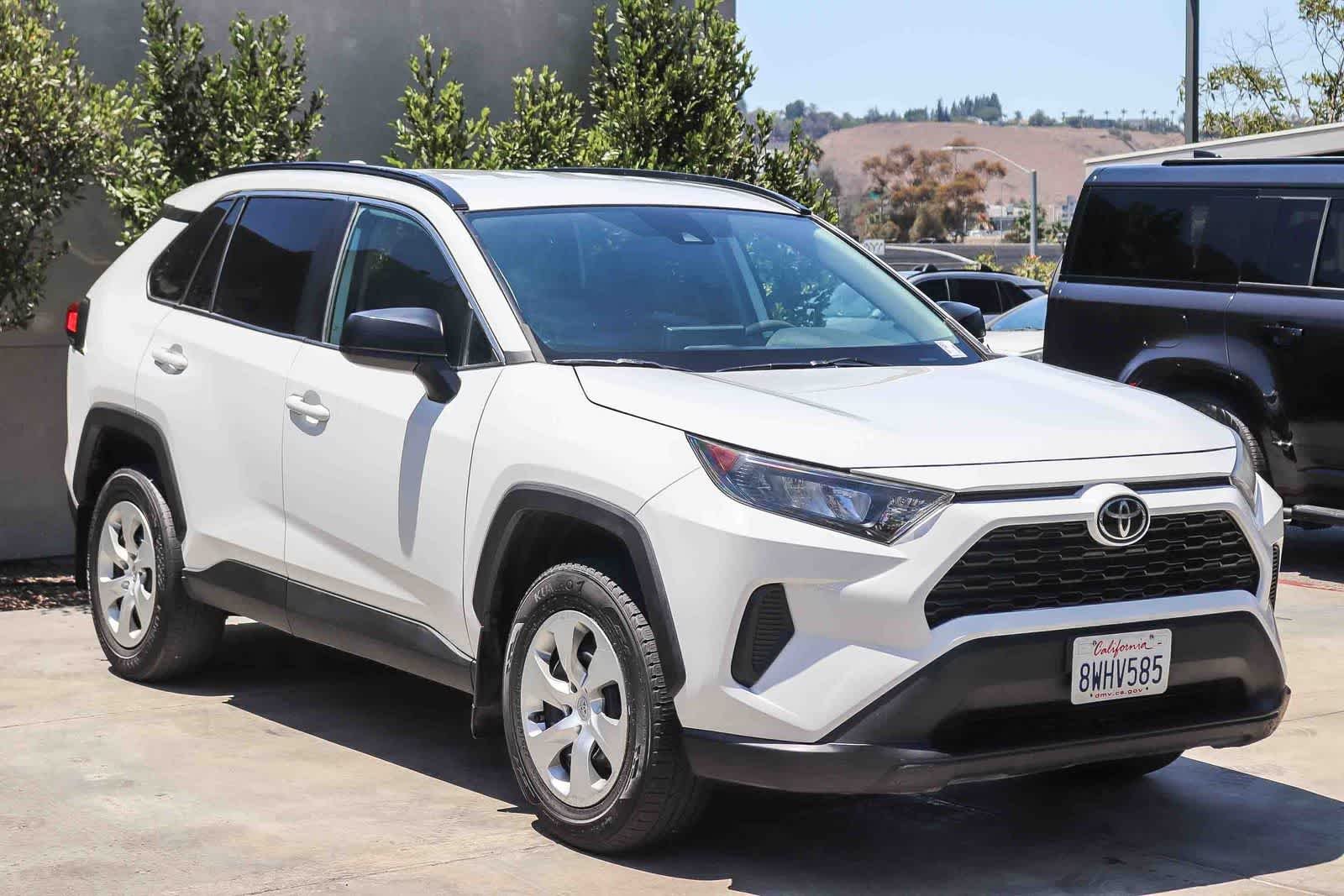 Used 2021 Super White Toyota LE image 3
