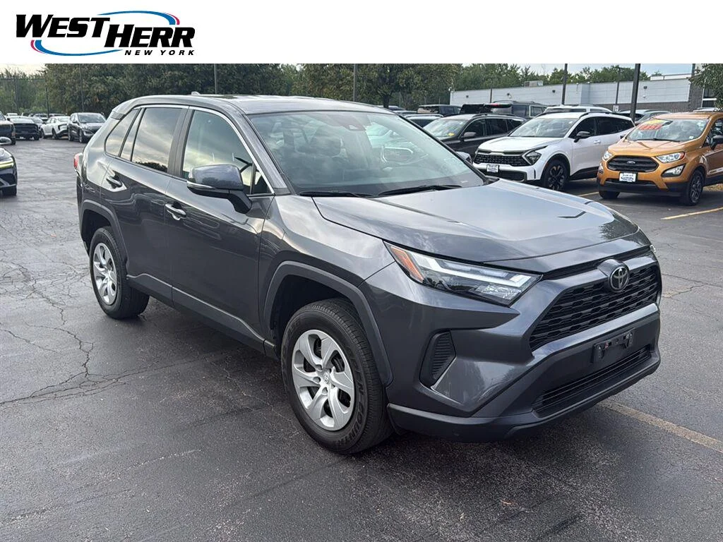 Used 2023 Magnetic Gray Metallic Toyota LE image 1