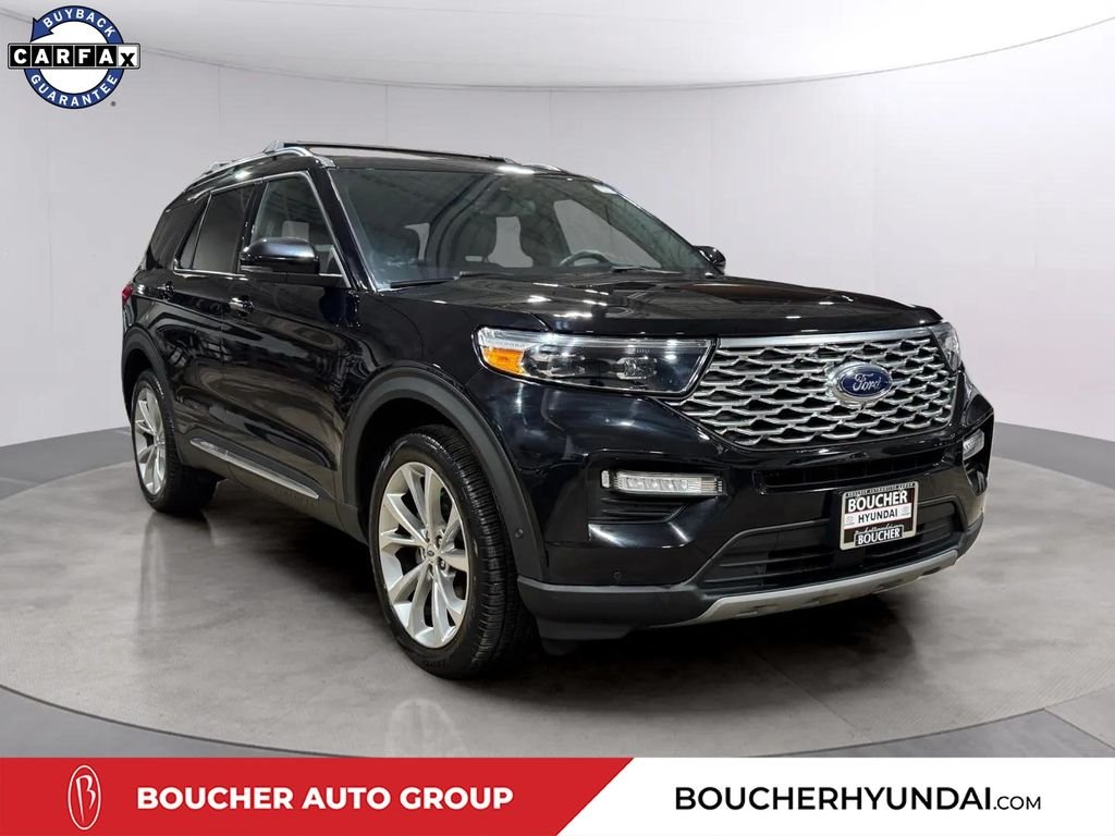 Used 2021 Black Metallic Ford Platinum image 1