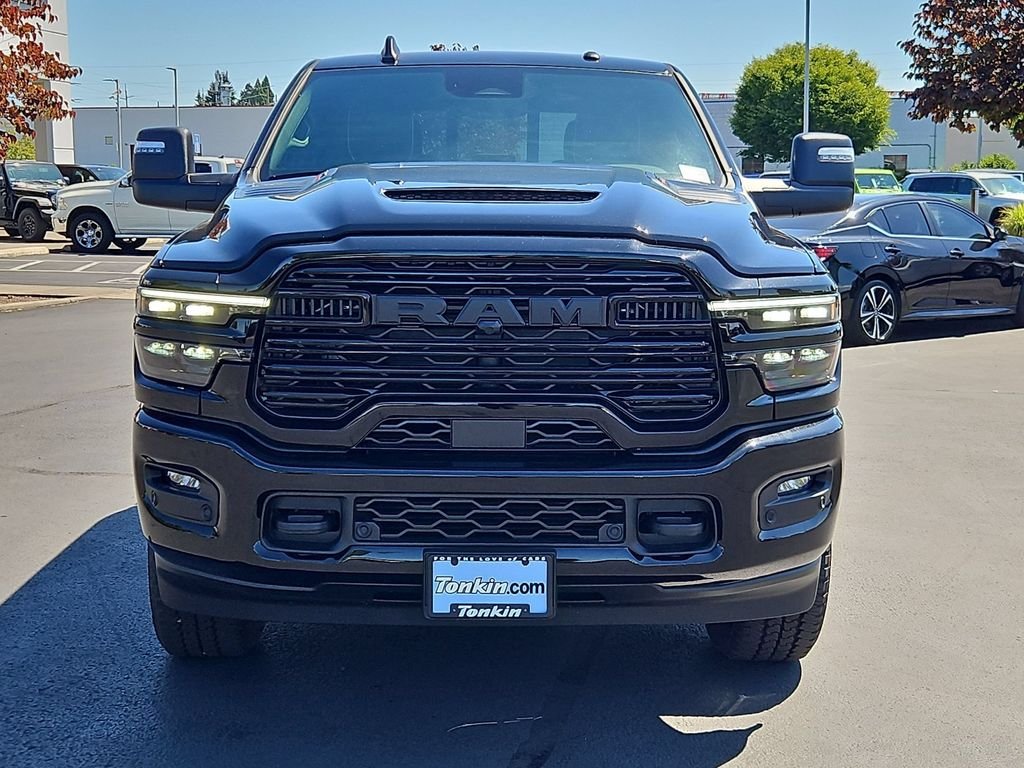 New 2026 Diamond Black Crystal Pearl-Coat Exterior Paint RAM Laramie image 9