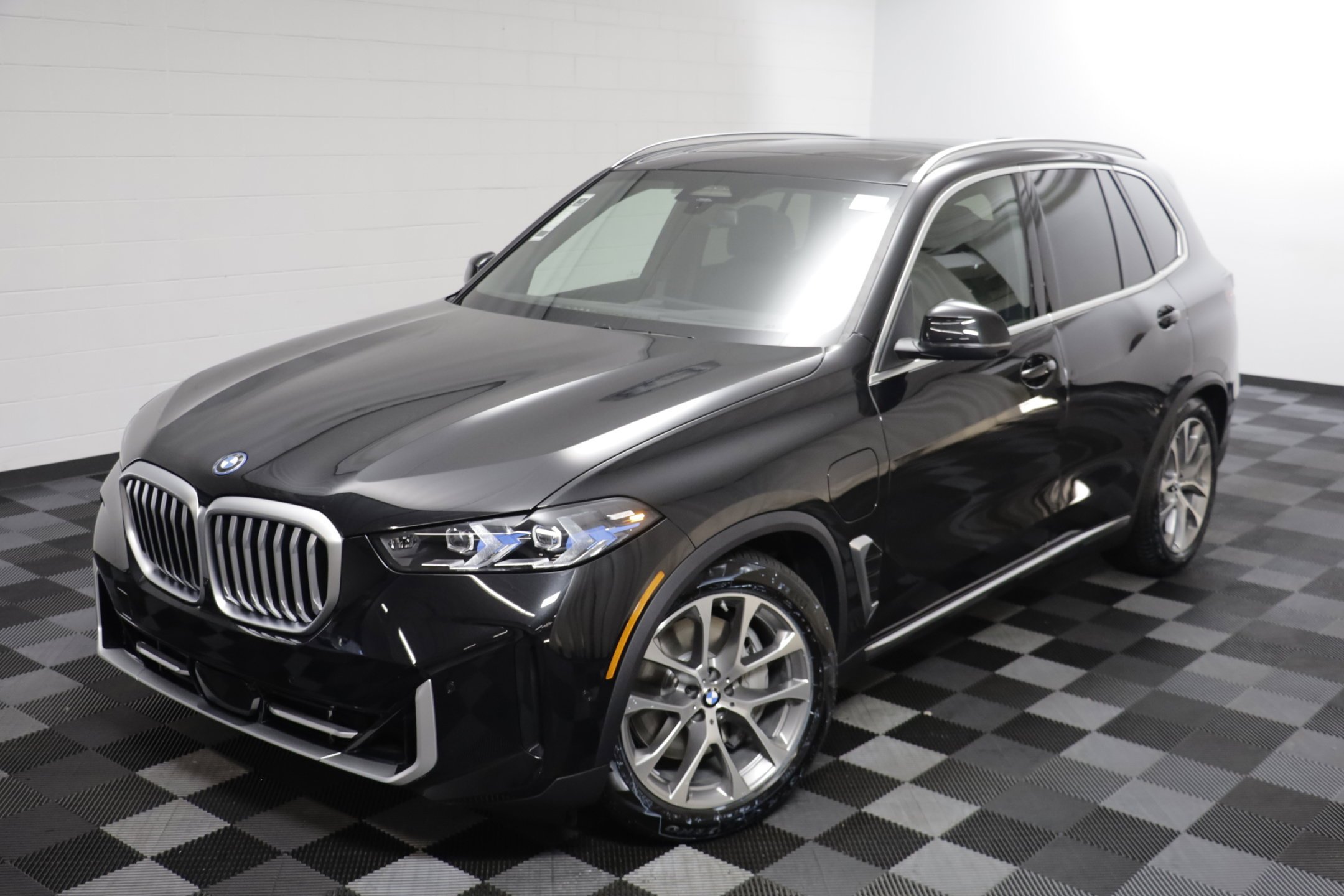 New 2026 Black Sapphire Metallic BMW xDrive50e image 2