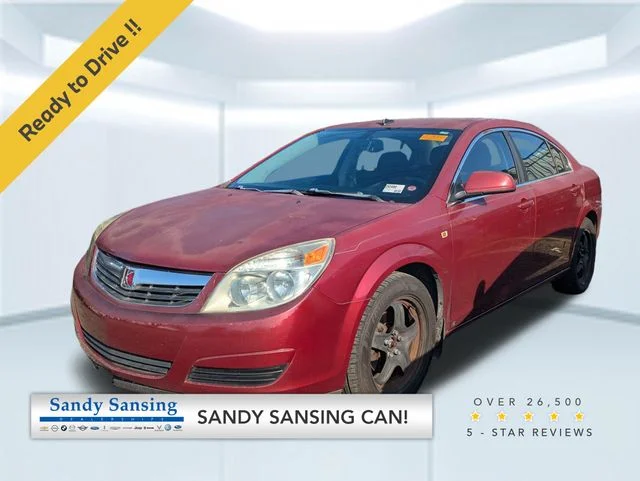 Used 2009 Red Saturn XE image 1