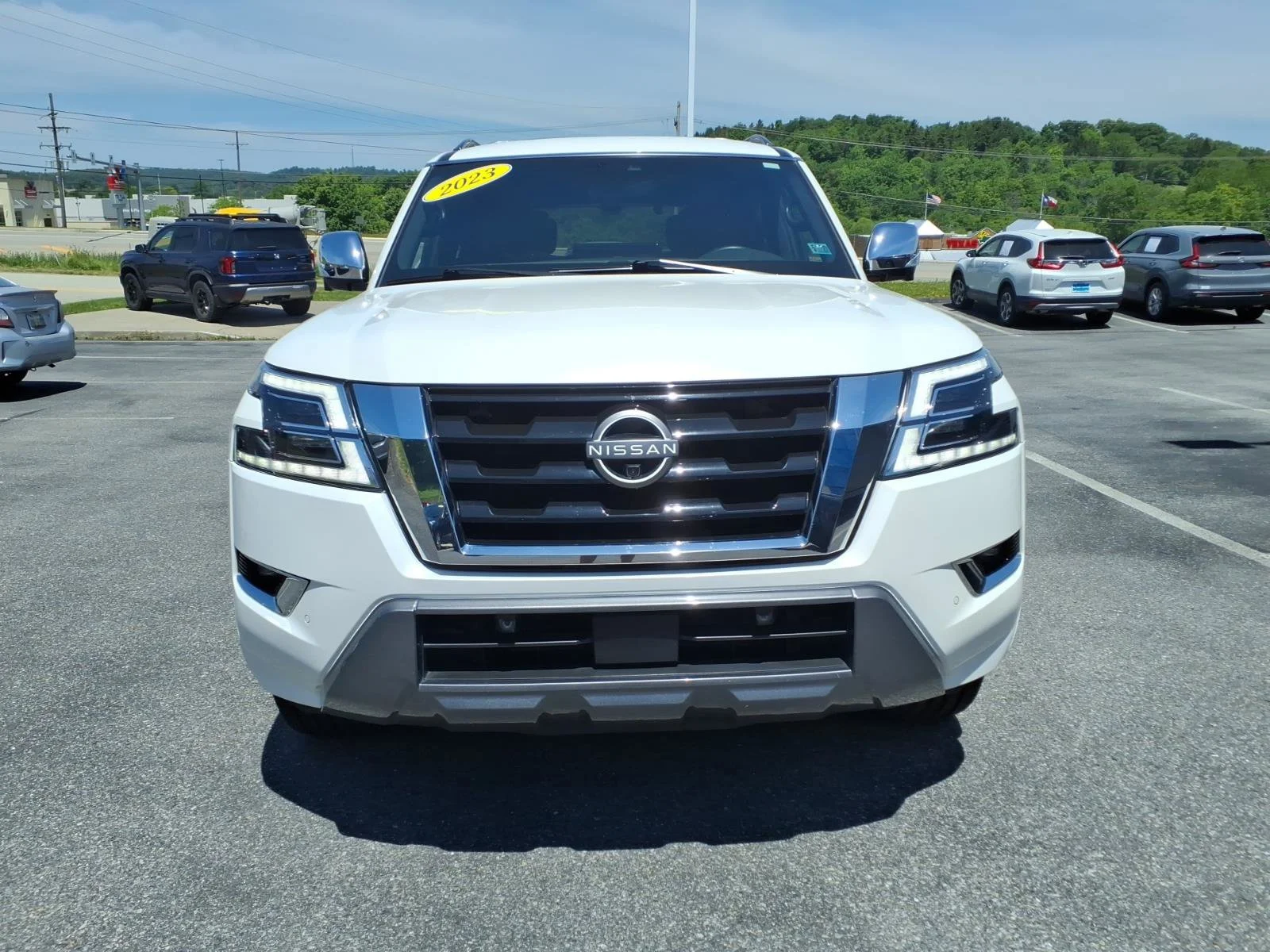 Used 2023 Aspen White Tricoat Nissan Platinum image 2