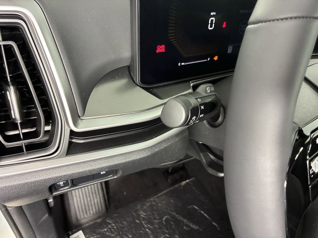 New 2026 Ivory Silver Kia LX image 13