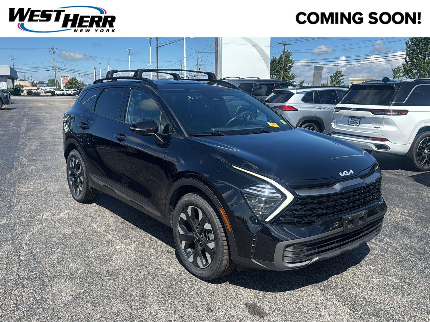 Used 2024 Ebony Black Kia X-Line image 1