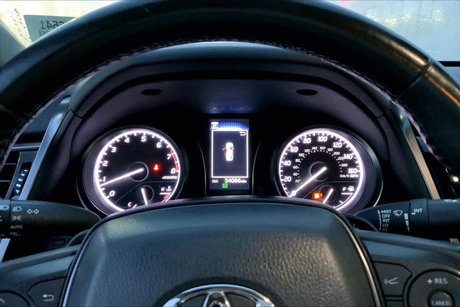 Used 2024 Cavalry Blue Toyota SE image 25
