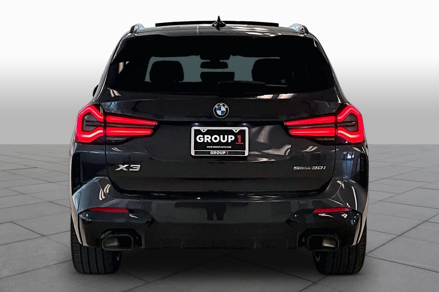 Used 2024 Dark Graphite Metallic BMW sDrive30i image 4