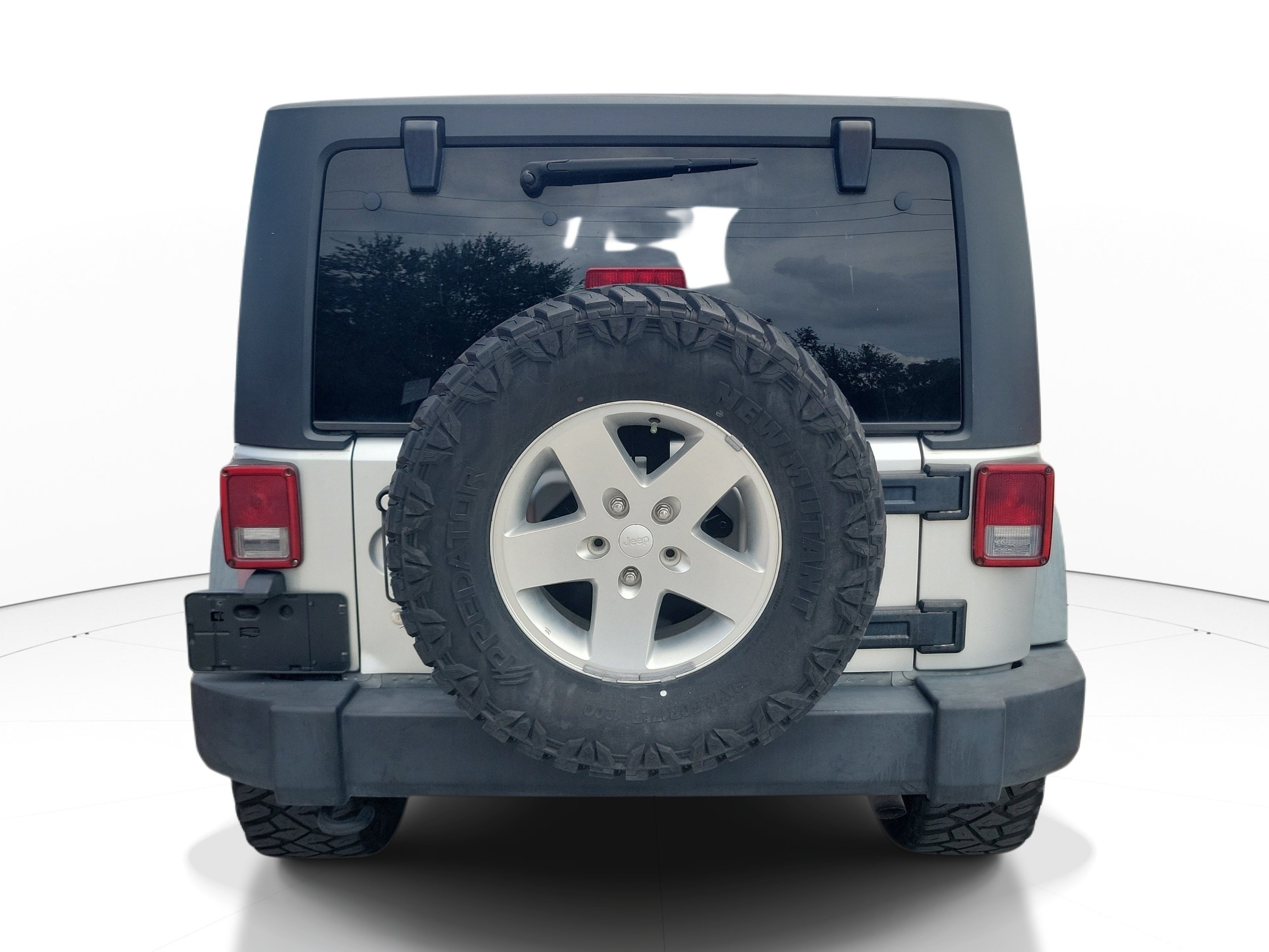 Used 2012 Bright Silver Metallic Jeep Sport image 7