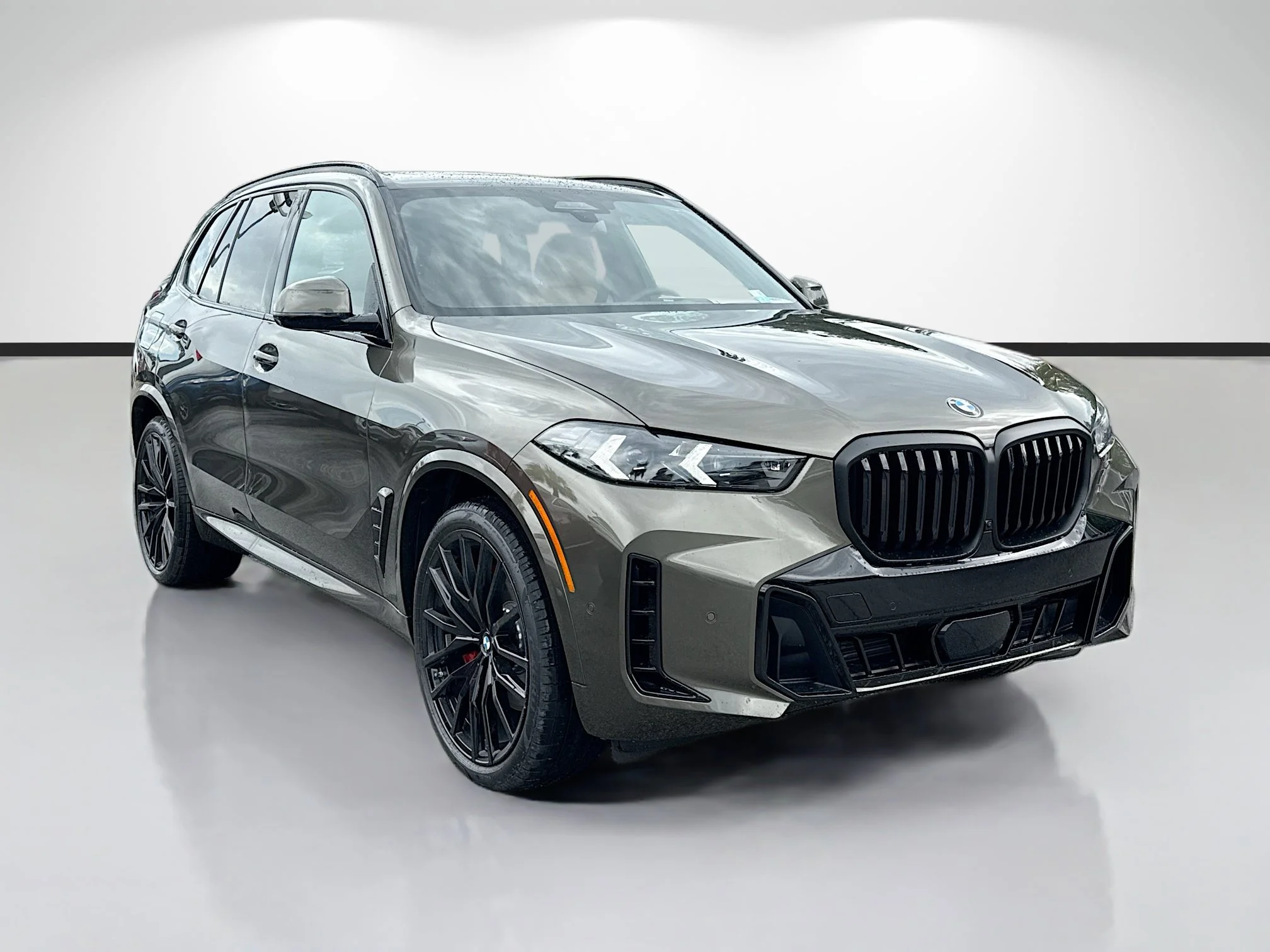 New 2026 Manhattan Green Metallic BMW xDrive40i image 1