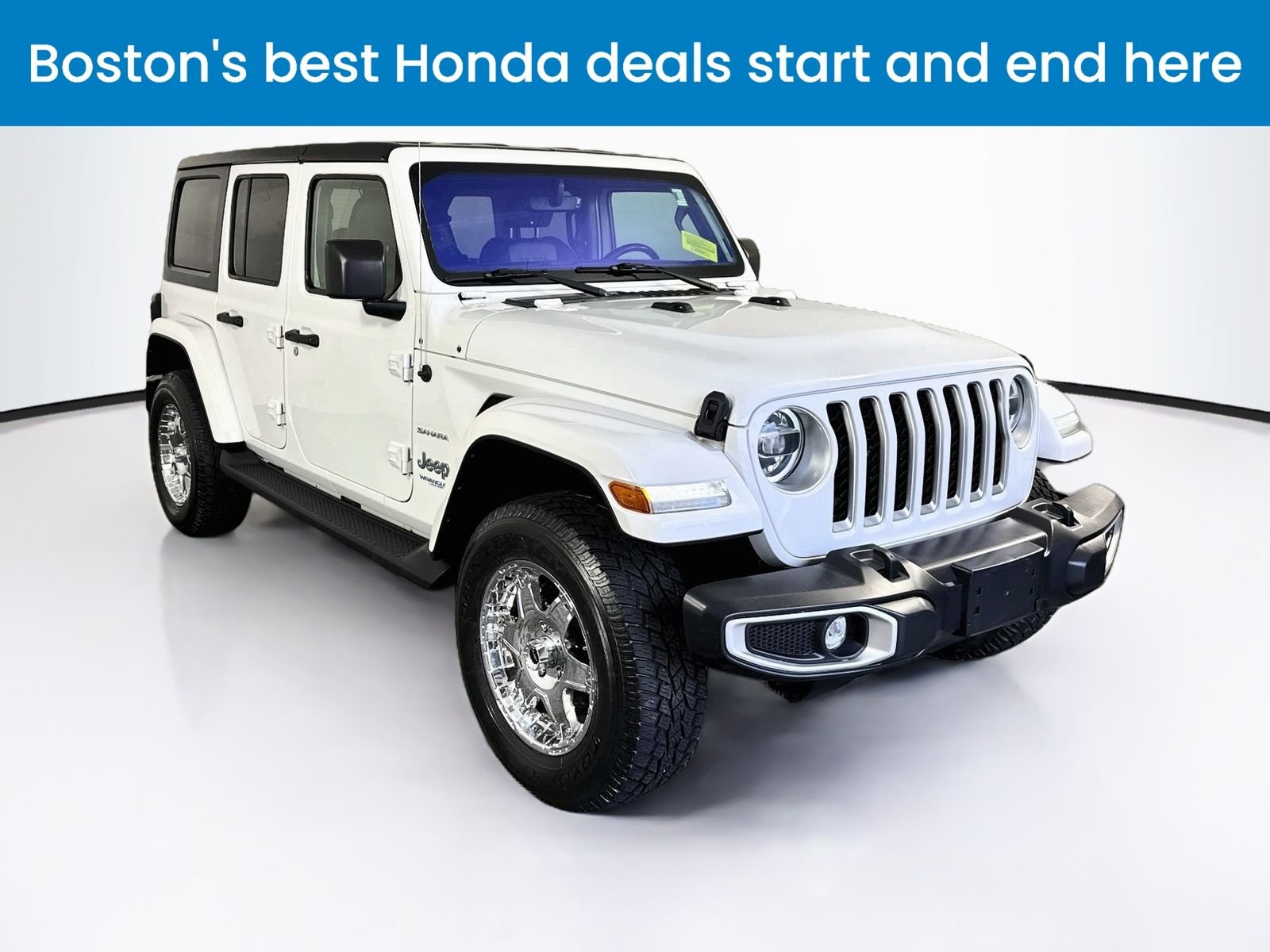 Used 2021 White Jeep Unlimited Sahara 4xe image 1