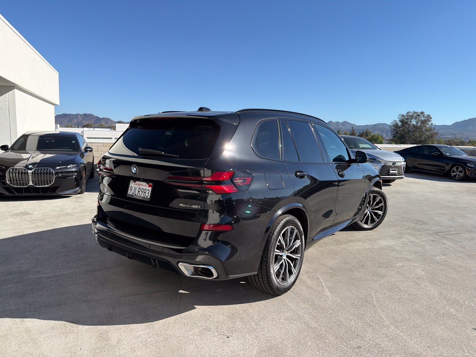 Used 2024 Black Sapphire Metallic BMW sDrive40i image 4
