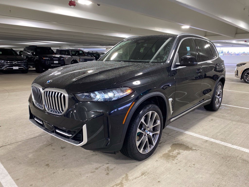 Used 2024 Black Sapphire Metallic BMW xDrive40i image 1