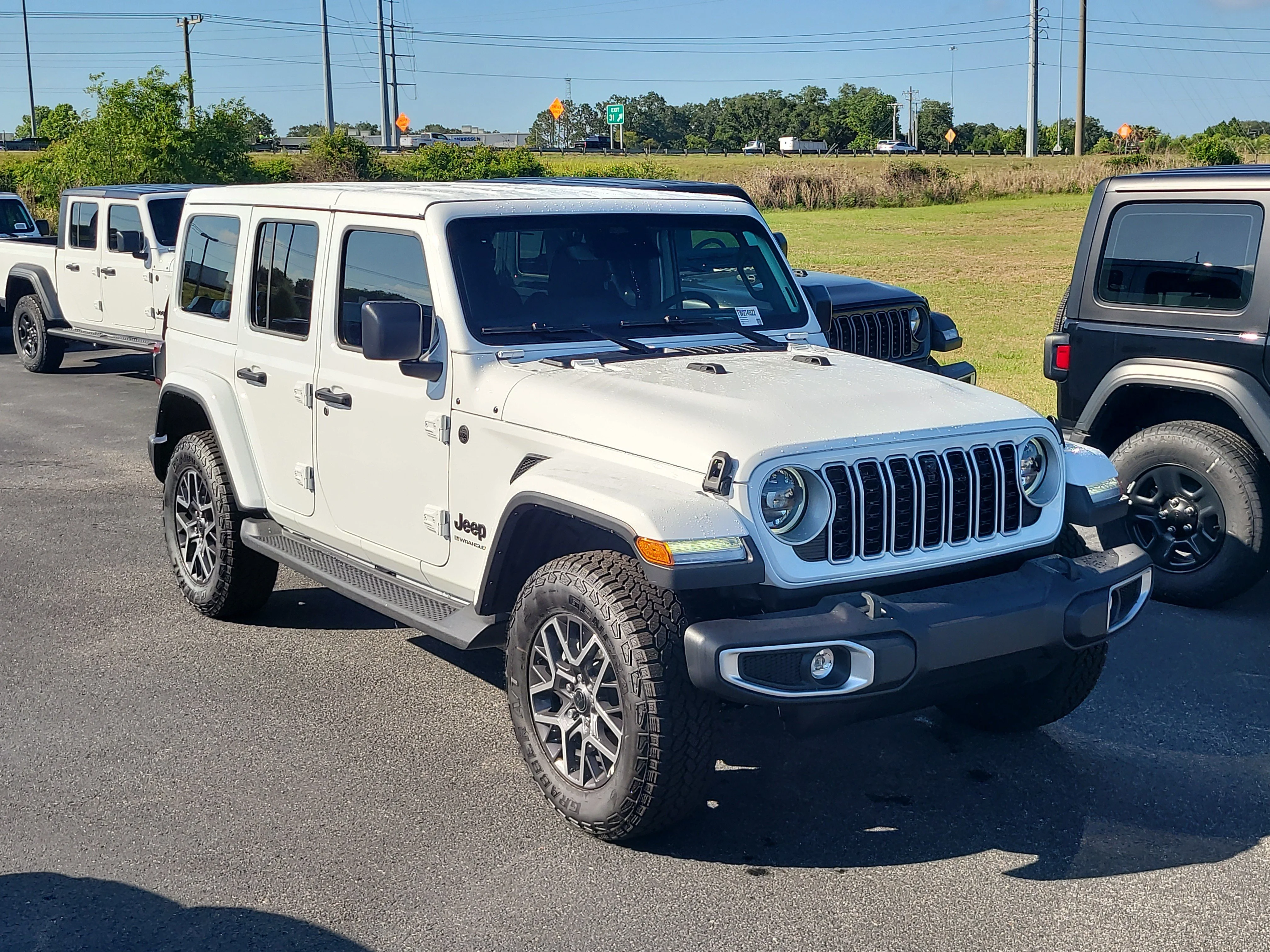 New 2026 Bright White Clearcoat Jeep Sahara image 1