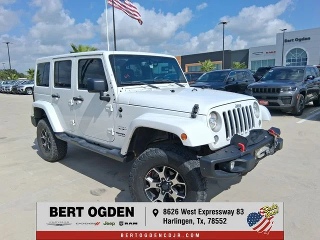 Used 2017 White Jeep Unlimited Sahara image 1