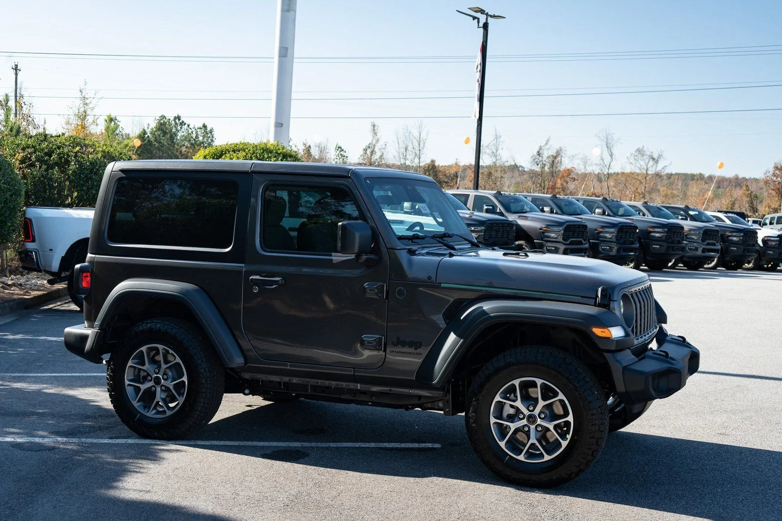 New 2026 Granite Crystal Metallic Clearcoat Jeep Sport S image 12