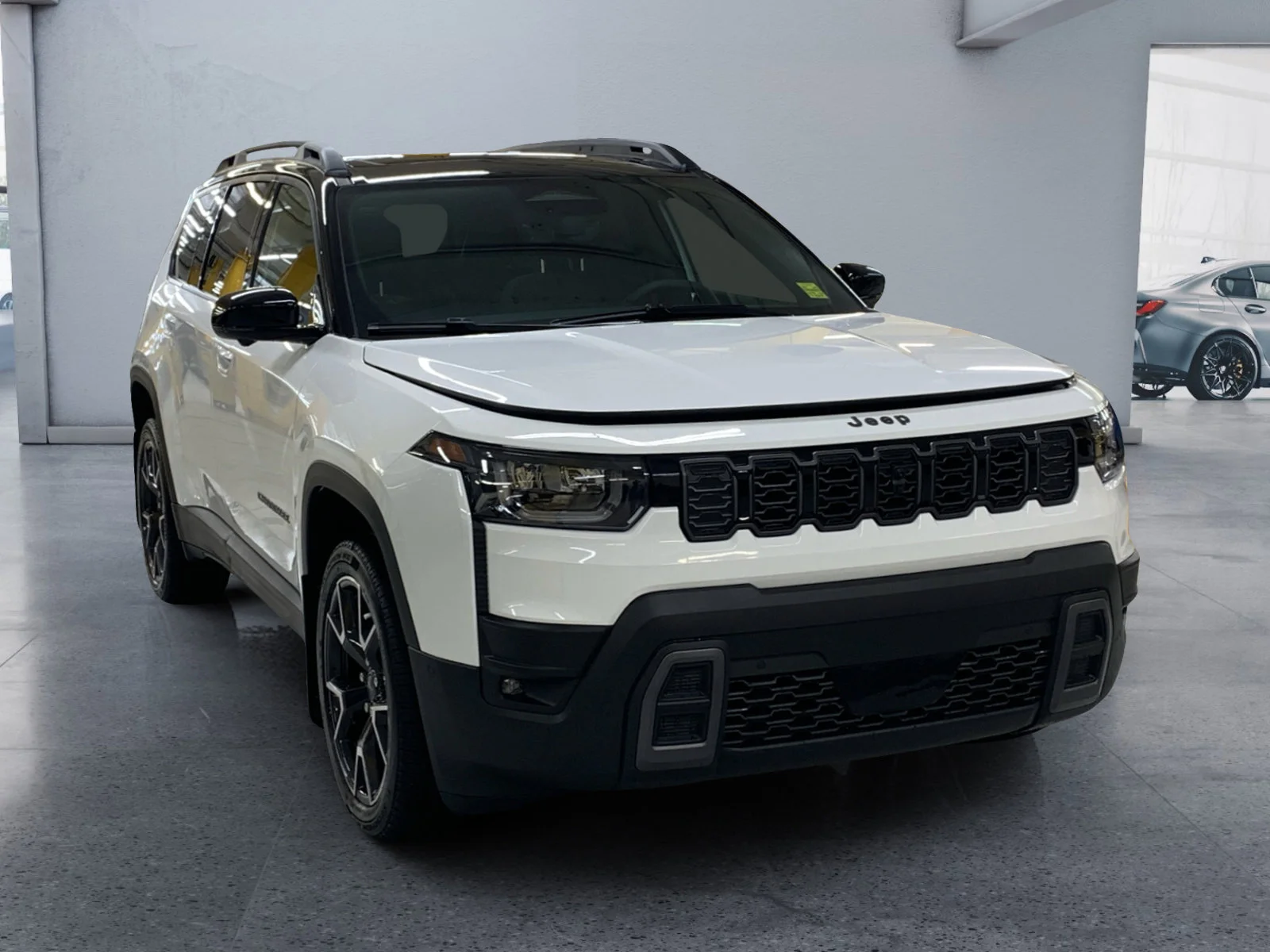 New 2026 Bright White Jeep Overland image 7