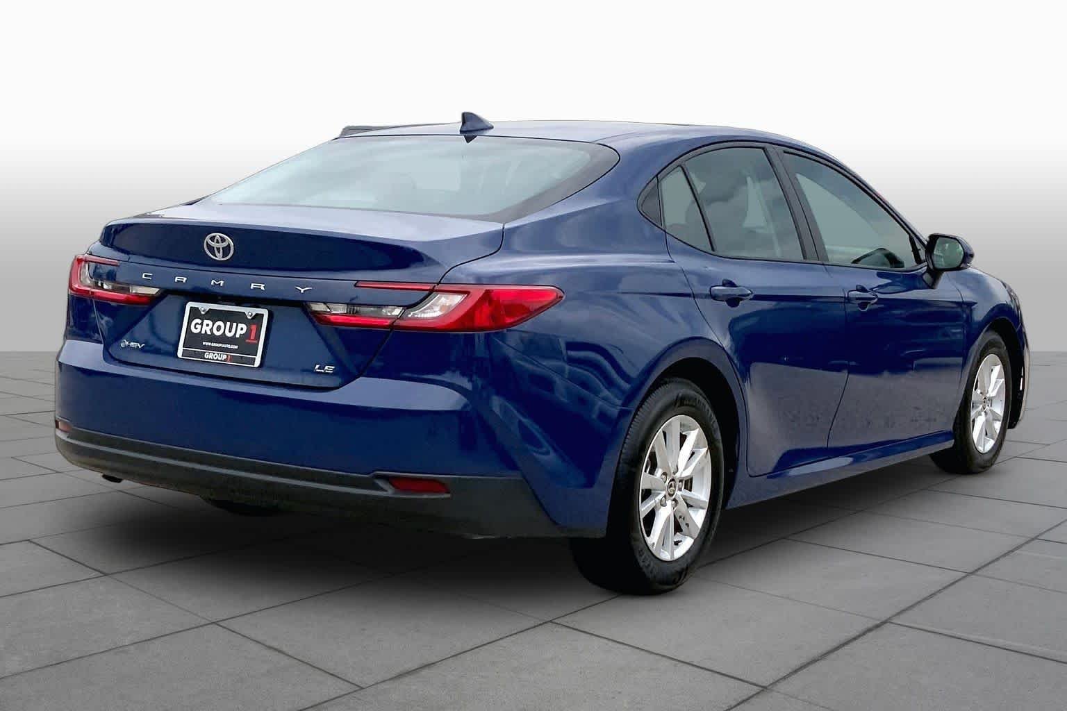 Used 2025 Reservoir Blue Toyota LE image 13