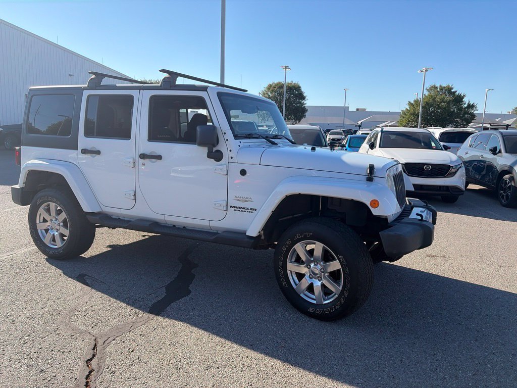 Used 2013 White Jeep Unlimited Sahara image 7