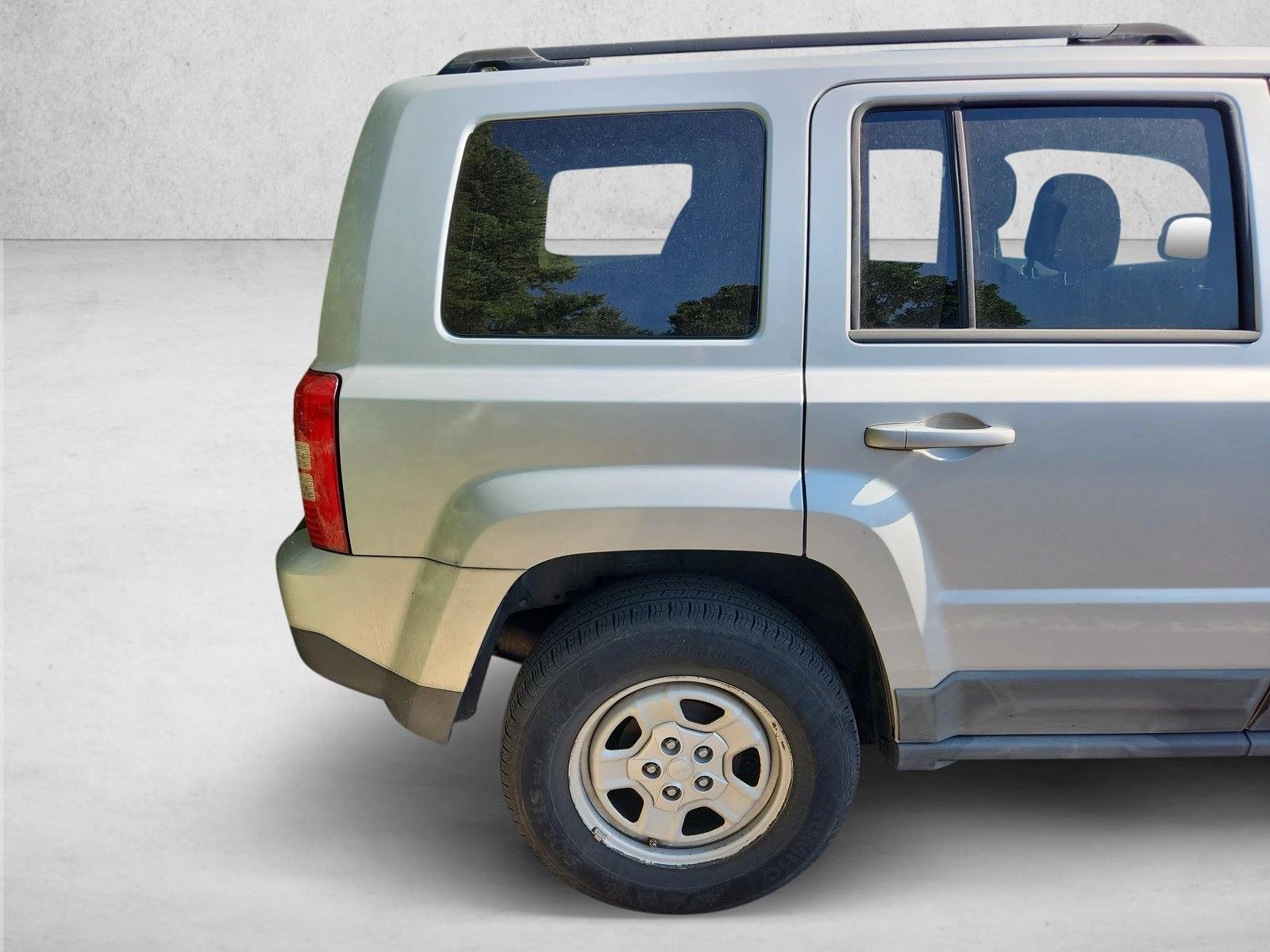 Used 2011 Bright Silver Metallic Jeep Sport image 9