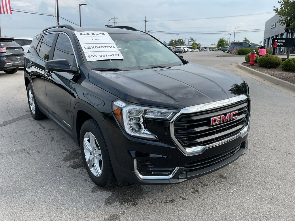 Used 2024 Ebony Twilight Metallic GMC SLE image 2