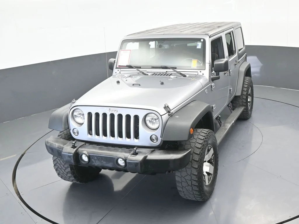Used 2016 Billet Silver Metallic Clearcoat Jeep Unlimited Sport image 45