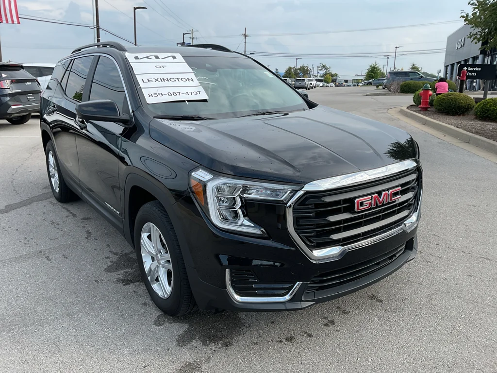 Used 2024 Ebony Twilight Metallic GMC SLE image 2