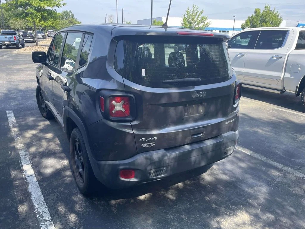Used 2019 Granite Crystal Metallic Clearcoat Jeep Sport image 4