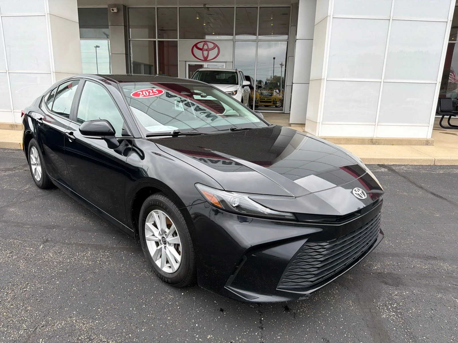 Used 2025 Black Toyota LE image 1