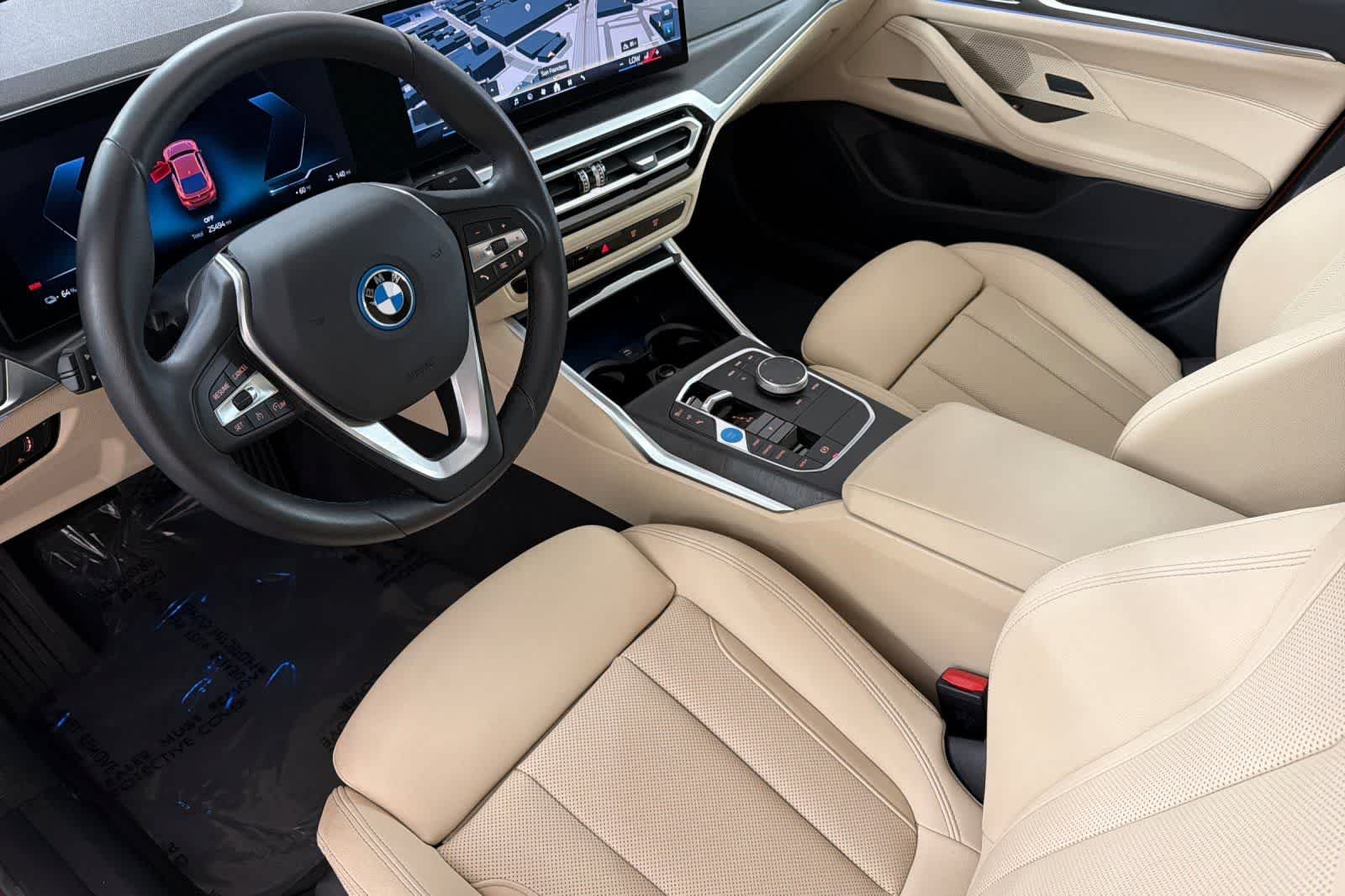 Used 2024 Sunset Orange Metallic BMW eDrive40 image 11