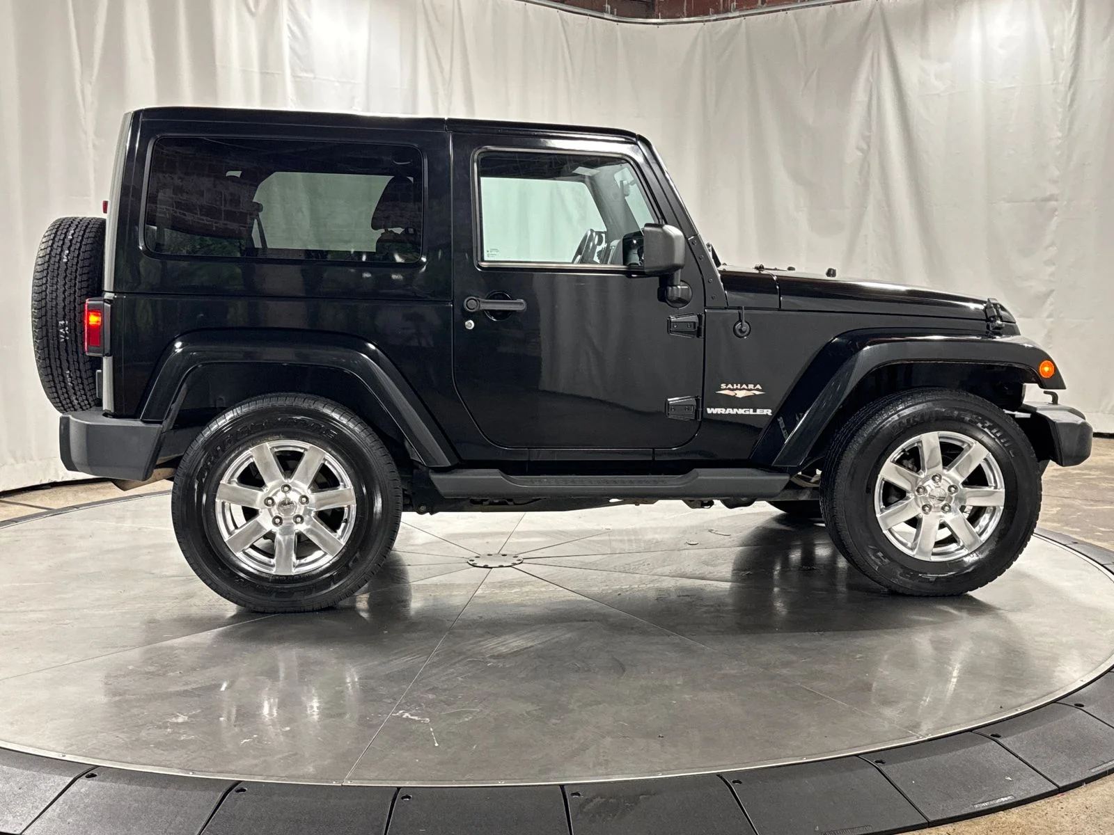 Used 2012 Black Clearcoat Jeep Sahara image 6