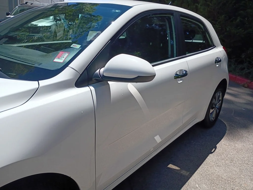 Used 2022 Clear White Kia S image 9