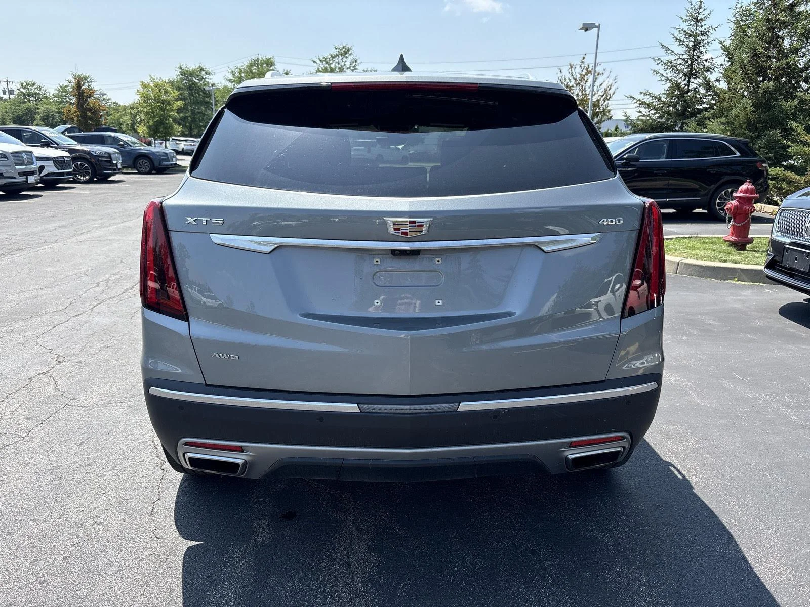 Used 2024 Argent Silver Metallic Cadillac AWD Premium Luxury image 18