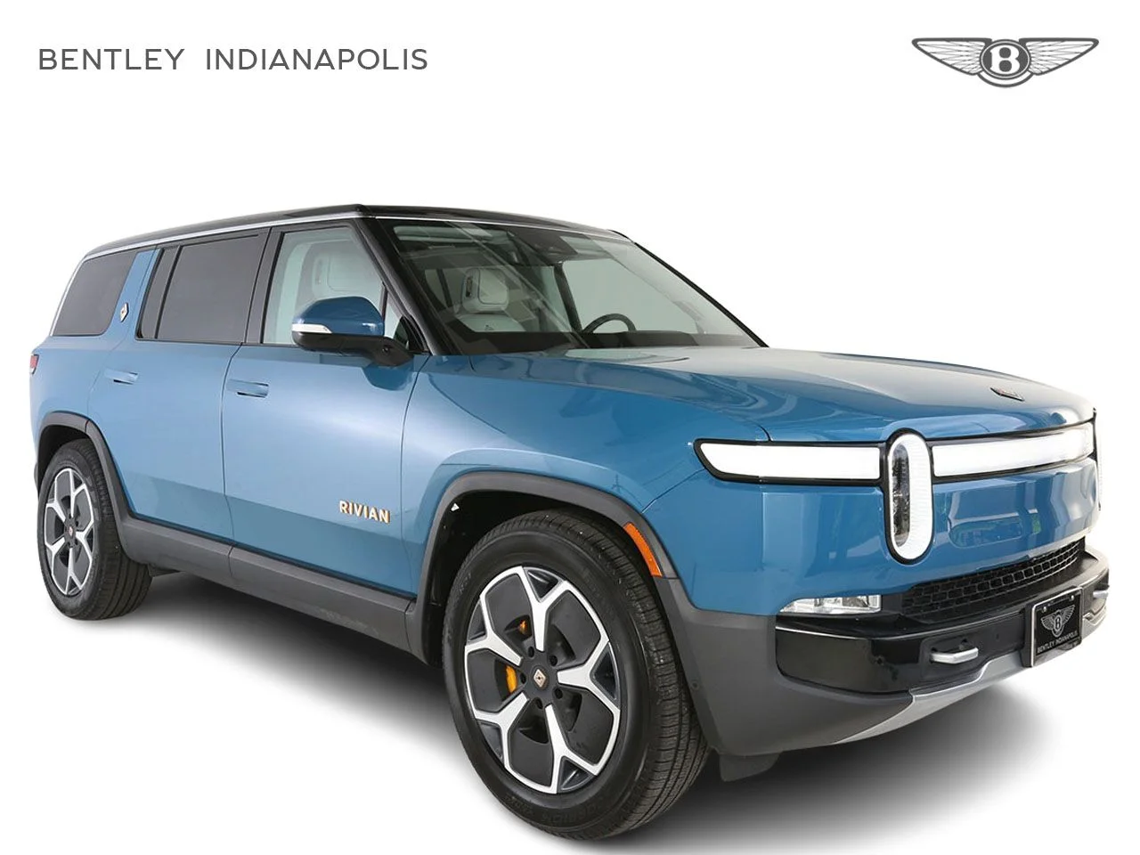 Used 2024 Blue Rivian Adventure image 1