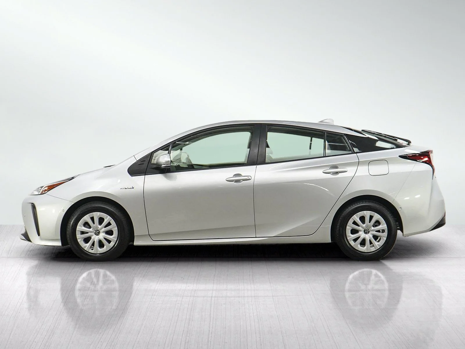Used 2021 Toyota Prius LE with VIN JTDKAMFU6M3134684 for sale in Burnsville, Minnesota
