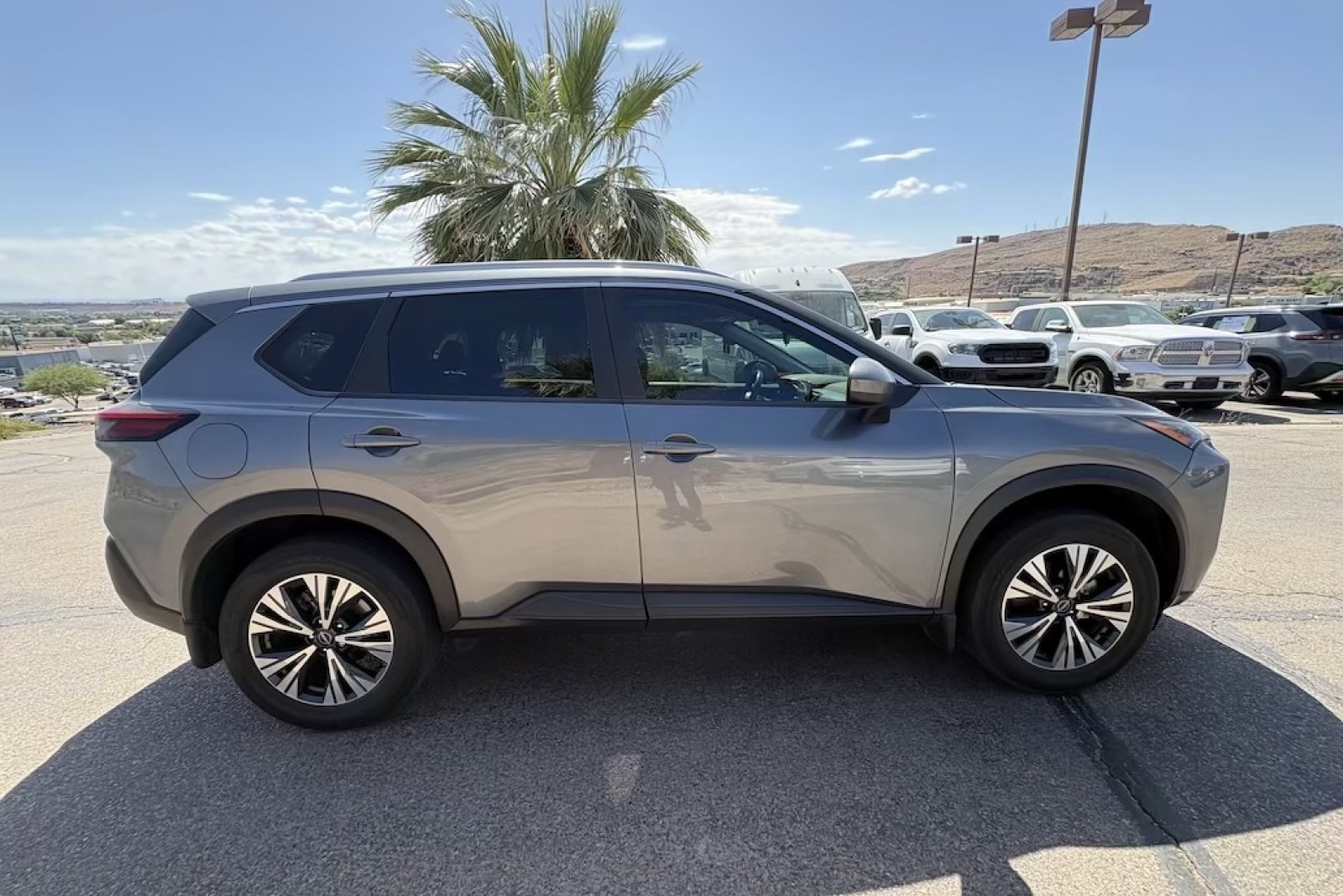 Used 2023 Gun Metallic Nissan SV image 7