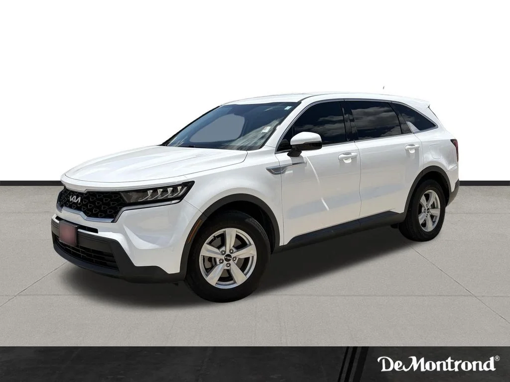 Used 2023 Glacial White Pearl Kia LX image 1