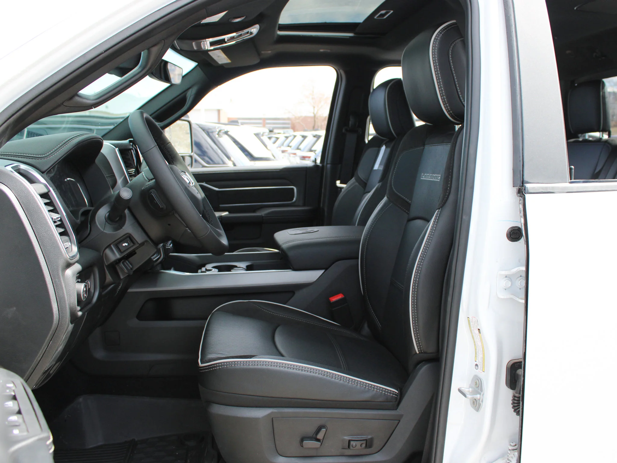 New 2026 White RAM Laramie* image 9