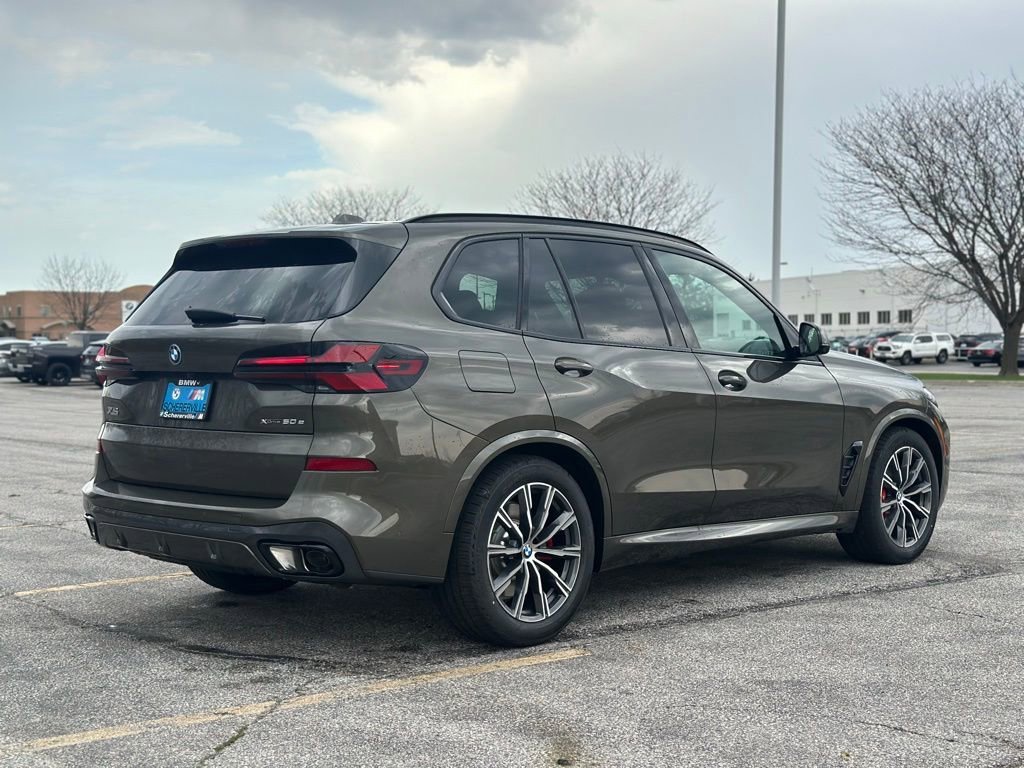 New 2026 Manhattan Green Metallic BMW xDrive50e image 7