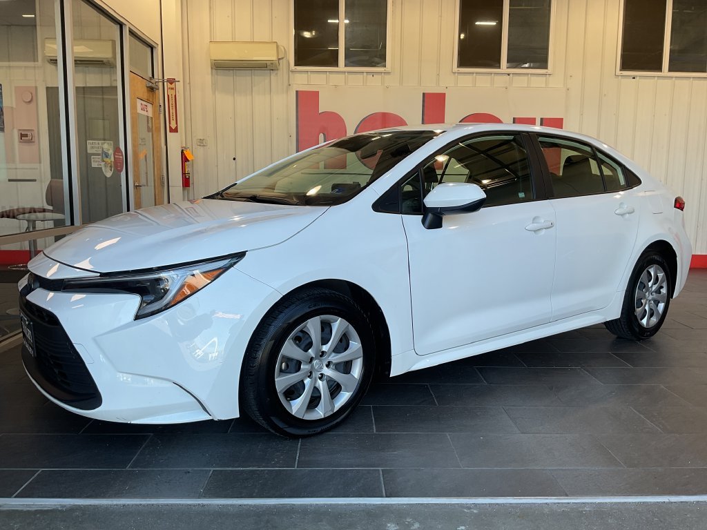 Used 2025 White Toyota LE image 2